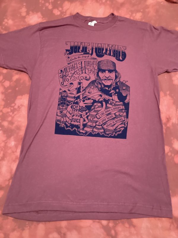 Wine-colored t-shirt with dark blue screenprinted design. Jolie Holland Celebrates the Songs of Michael Hurley, illustration by Jack Fallowes.